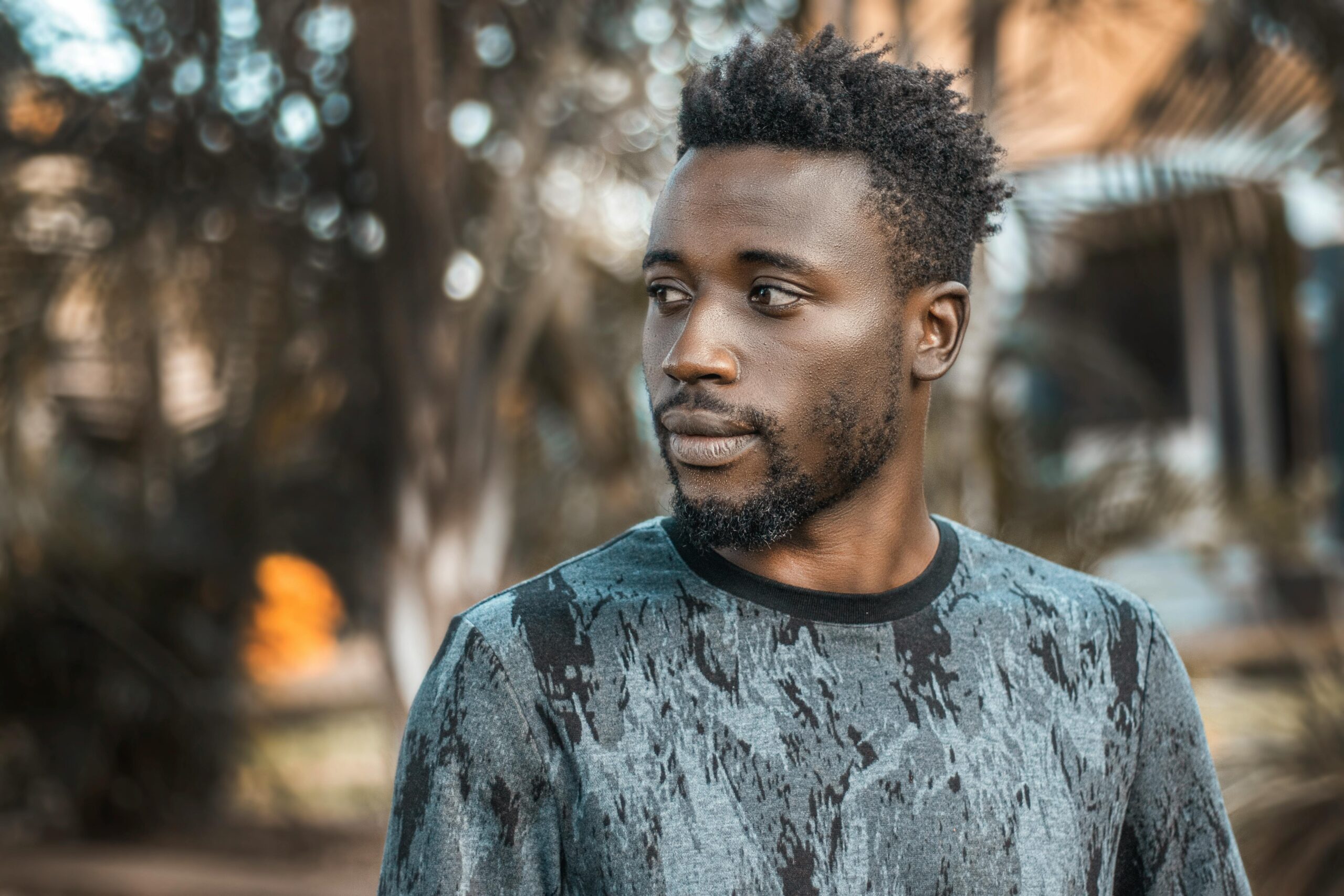 Handsome African man enjoying the outdoors in Kampala, Uganda.